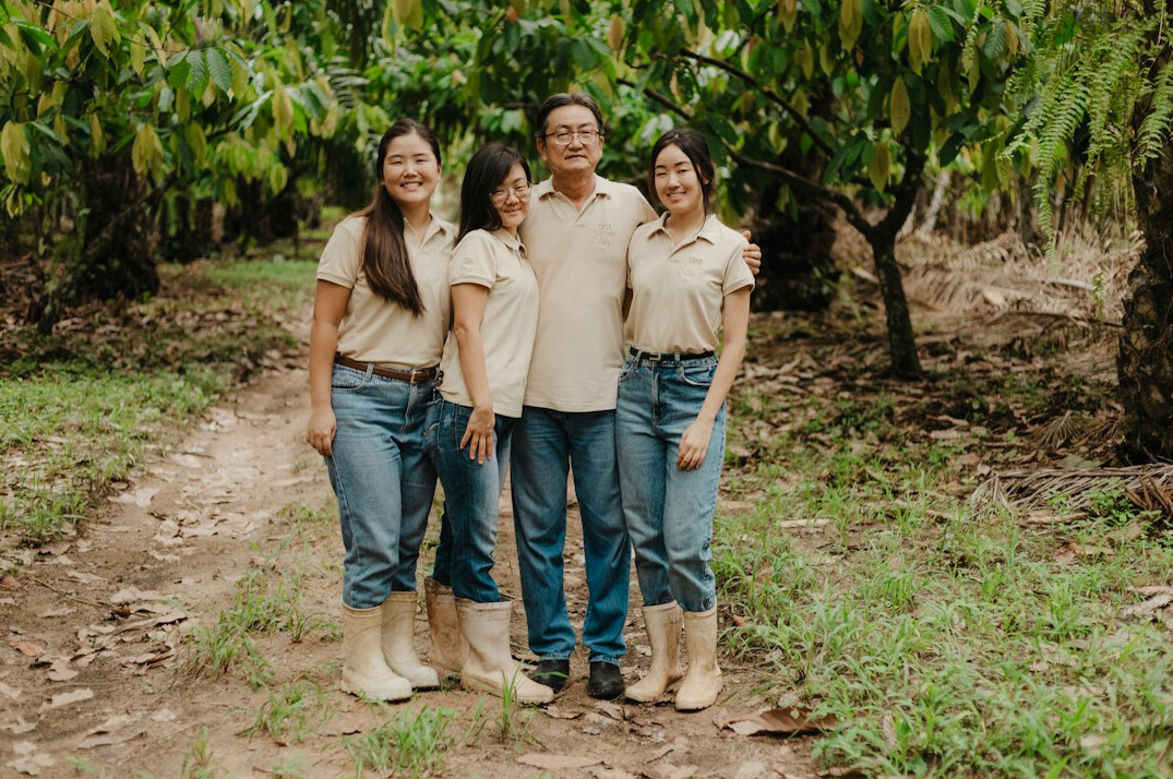 Diverse brazilian group standing together smiling outdoors