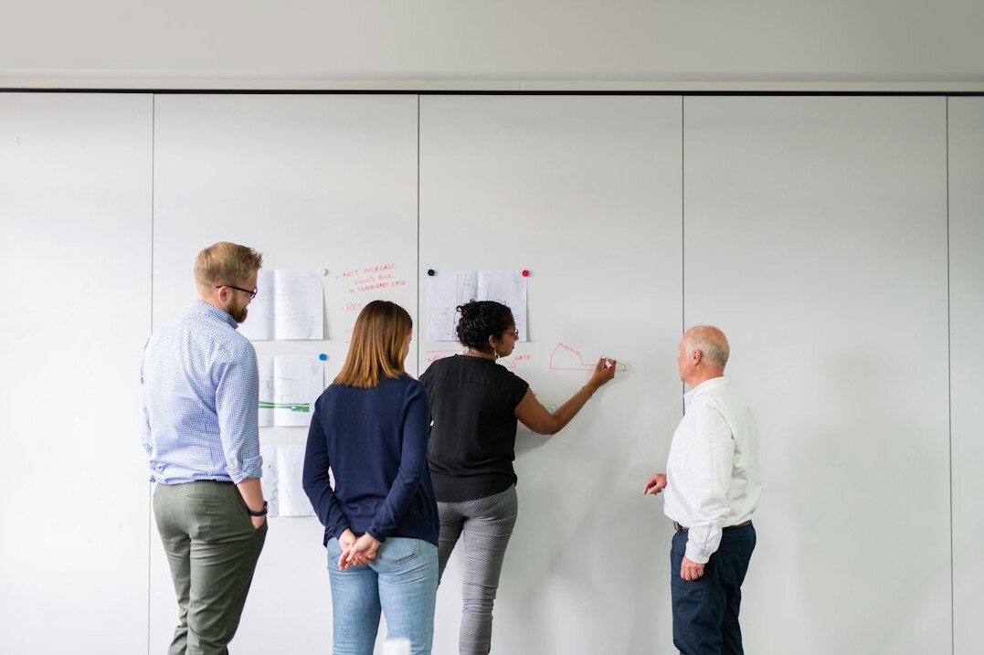 woman leading team meeting