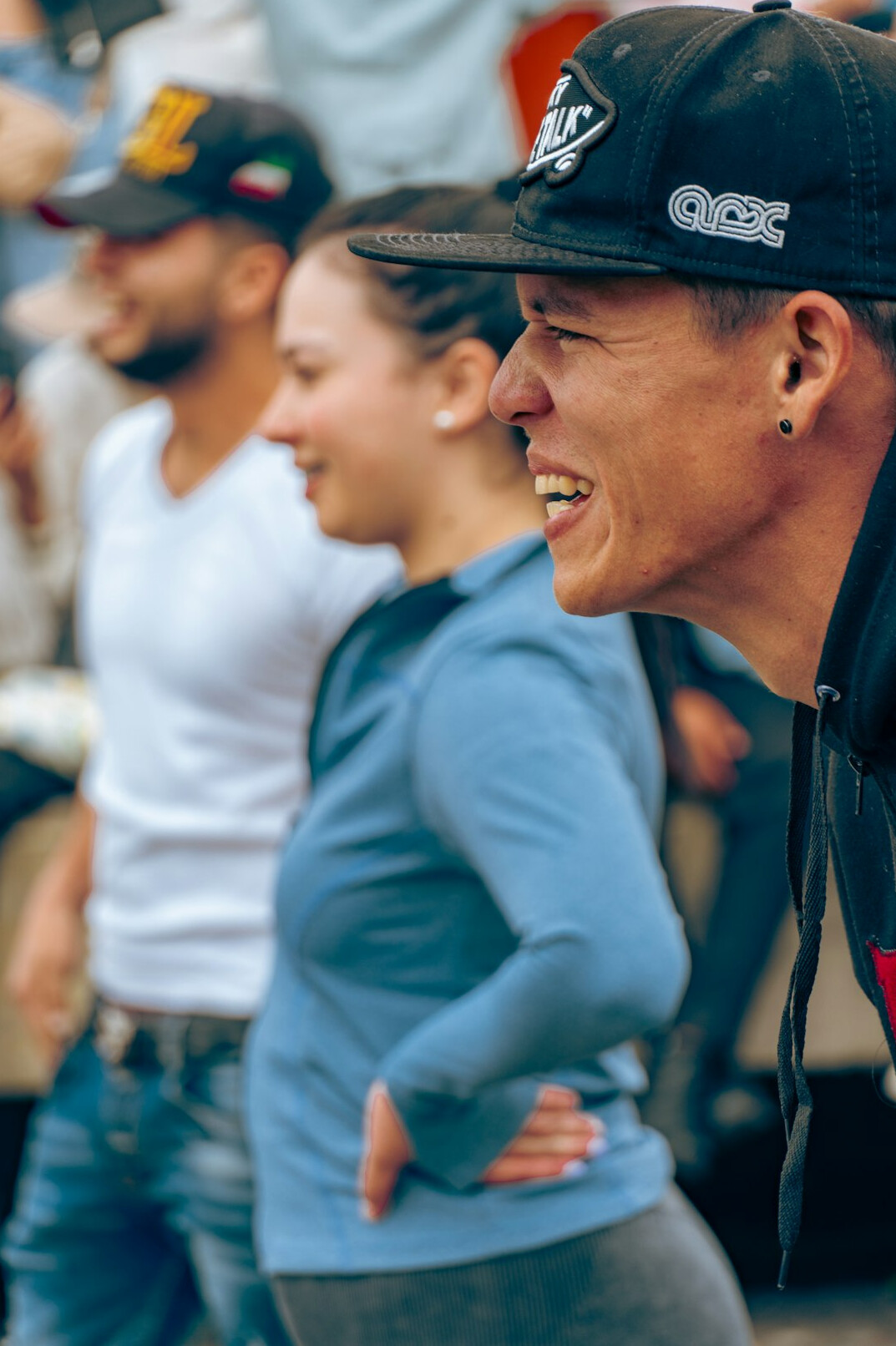Diverse group of brazilian people laughing together outdoors