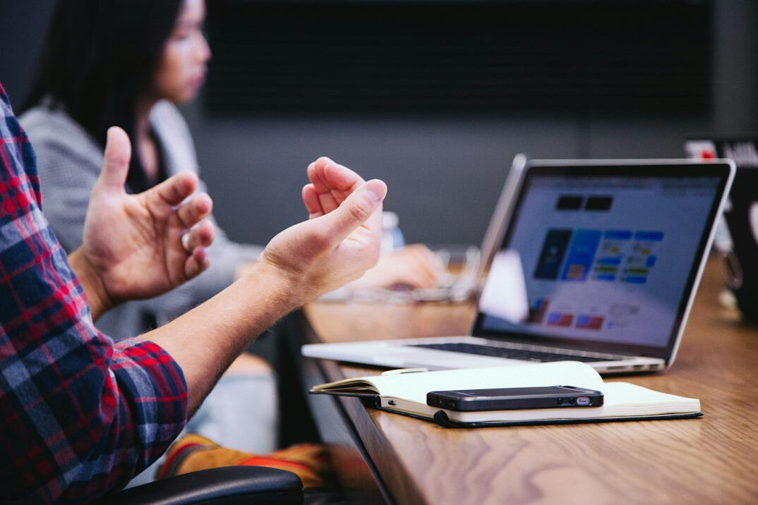 confident person speaking in meeting